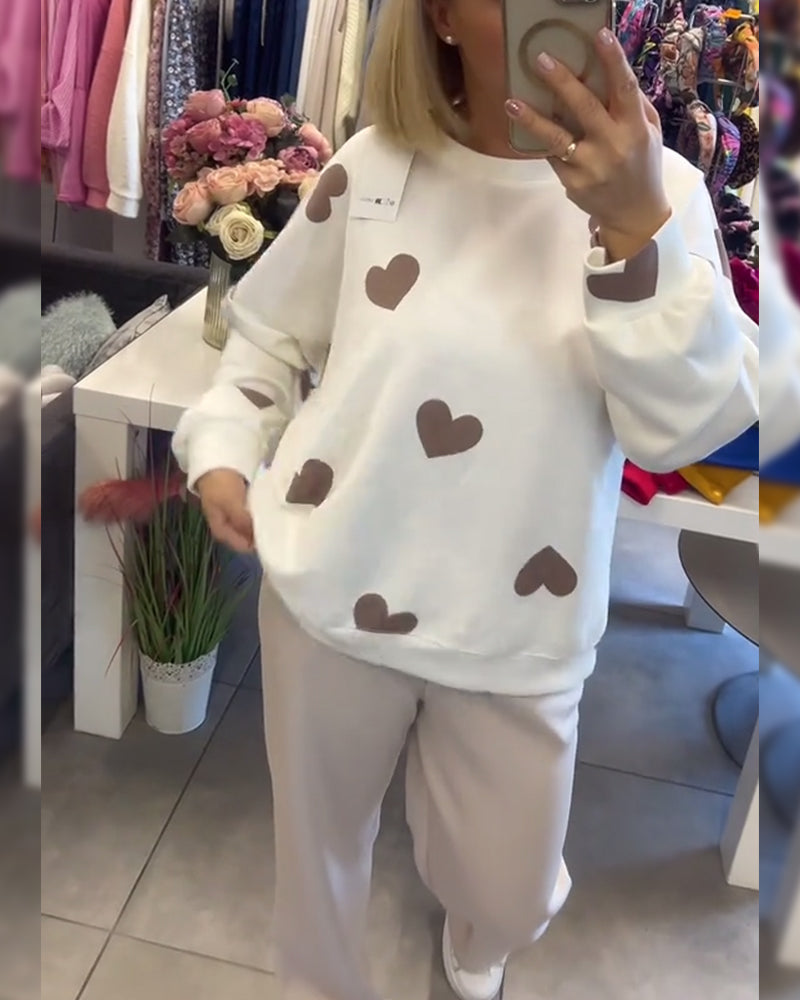 Suéter cómodo con corazones