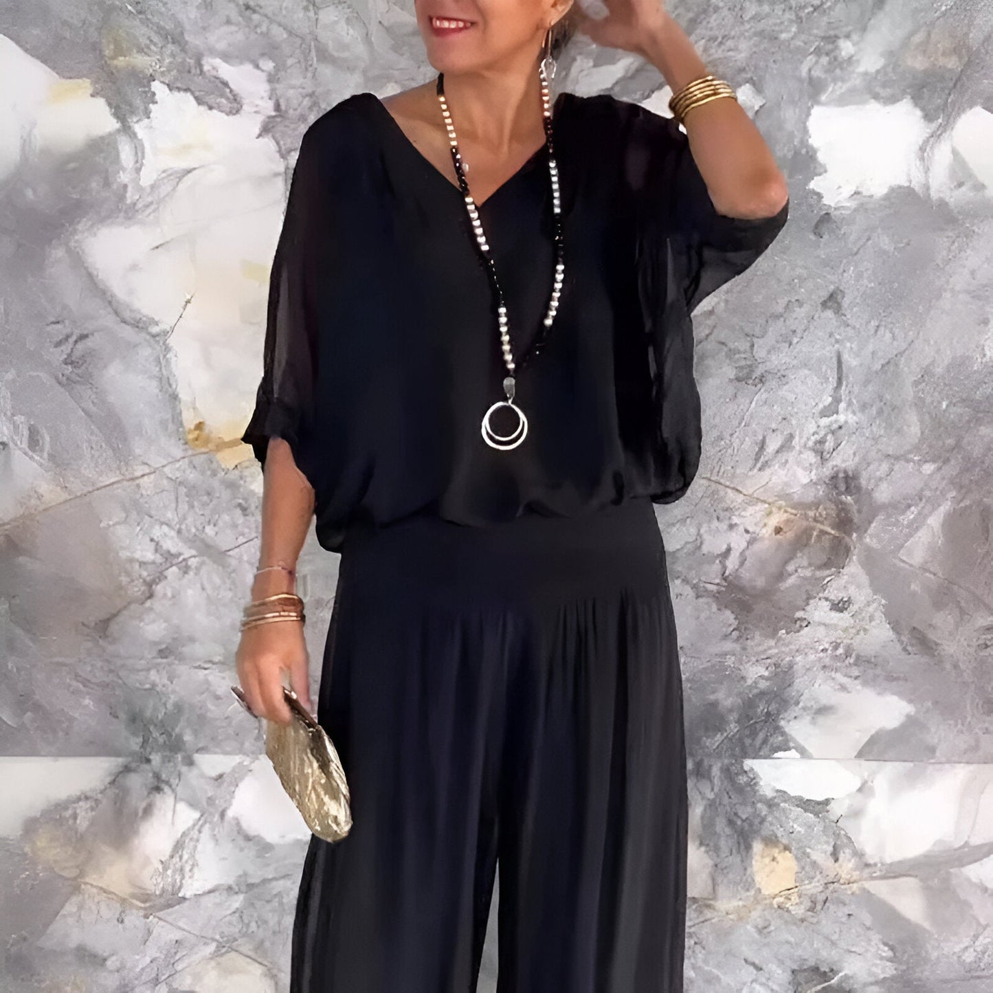 Conjunto elegante top de cuello en V y pantalón