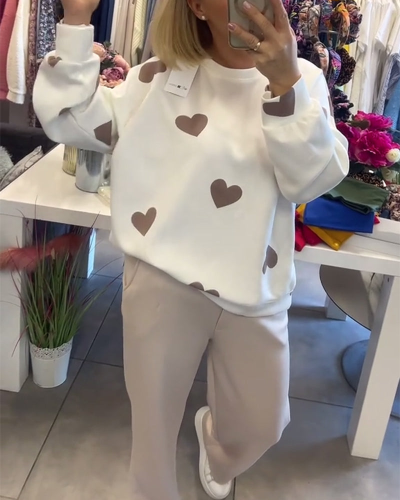 Suéter cómodo con corazones
