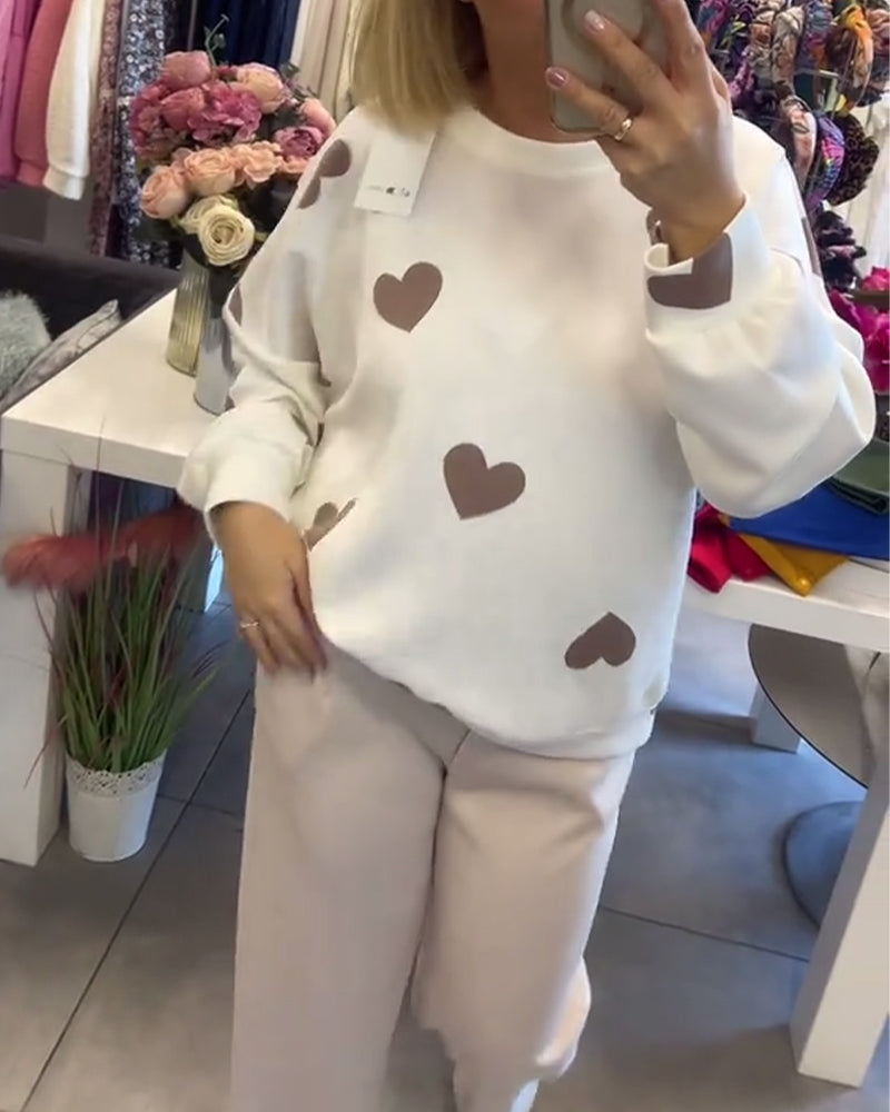 Suéter cómodo con corazones