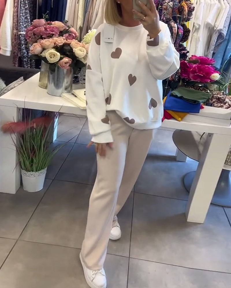 Suéter cómodo con corazones