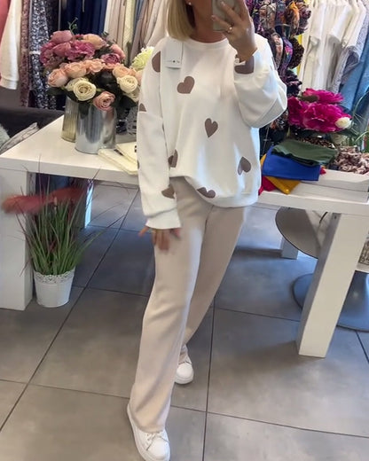 Suéter cómodo con corazones
