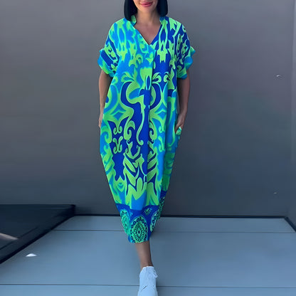 Vestido maxi fluido con estampado vibrante